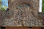 Banteay Srei temple - ancillary building of the causeway, Vishnou in the form of Narasimha holds upside-down Hiranya-Kasipu, the king of the Asuras 